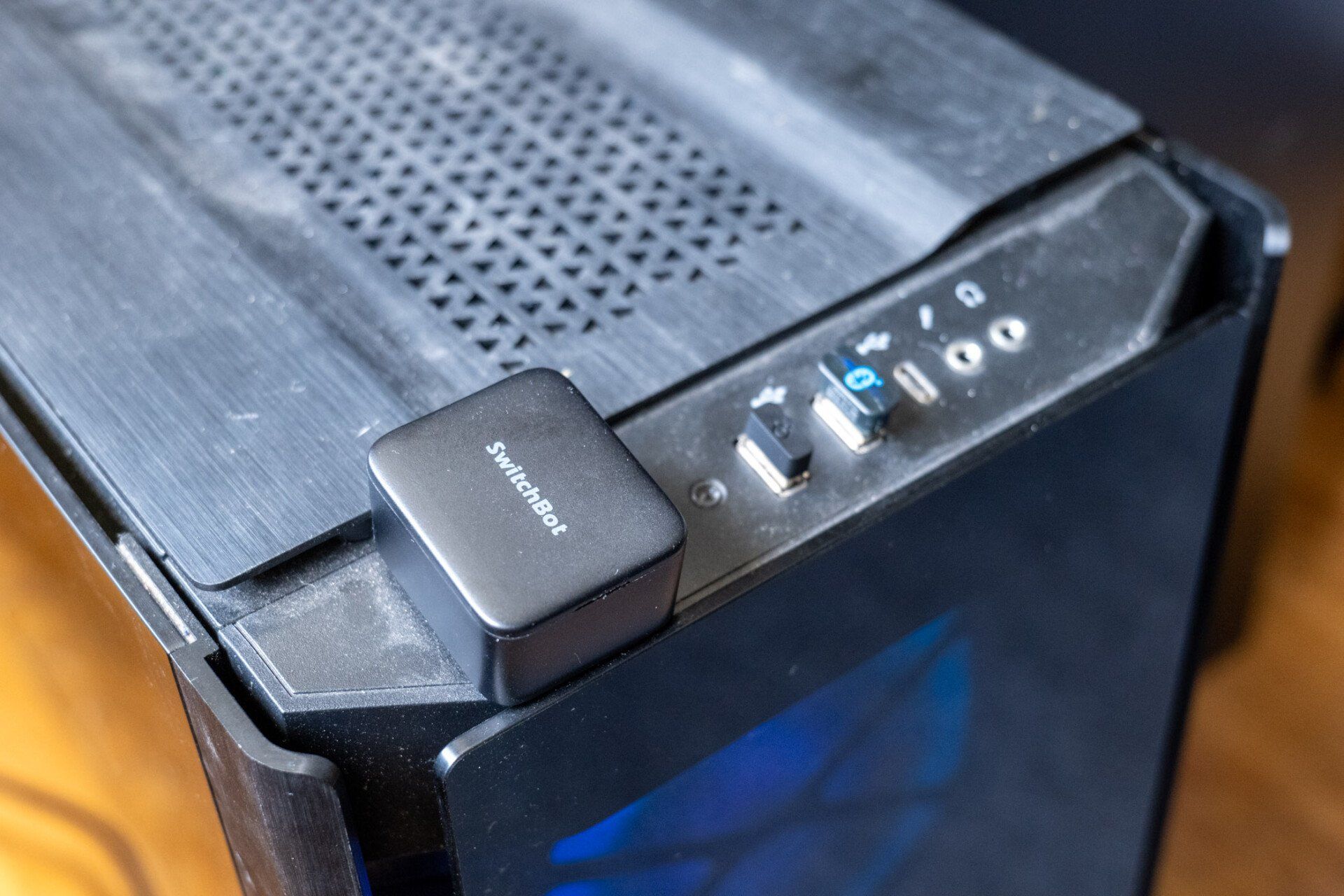 Matter alpha switchbot button presser attached to a gaming pc